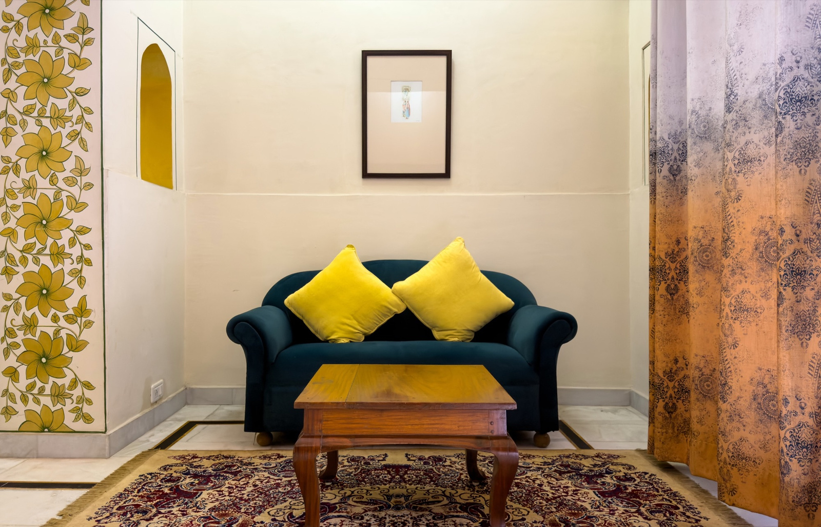 Palace Room — lounge corner with sofa and gold cushions